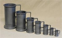 Pewter Measures in Graduated Sizes.