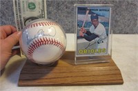 Signed Frank Robinson Baseball + Card Stand