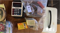 Calculators, matches, and other items