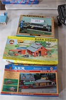 Three HO models in boxes