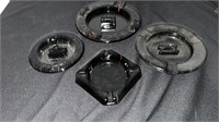 4 Black ashtrays