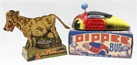 Schwarze Dip-Pee Bug Pull & Tin Litho Moo Cow