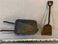 Vintage metal wheelbarrow shovel toy display