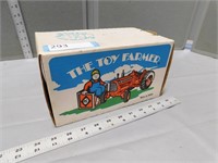 Toy tractor in the box