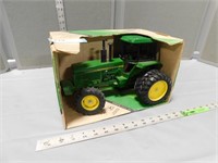 John Deere MFWD row crop tractor in the box,