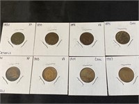 Eight antique Indian head penny coins in holders