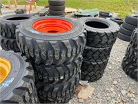 4 Unused 12-16.5 Tires on Orange Wheels