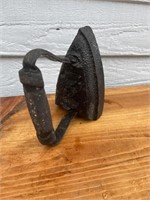 Antique number five sad iron