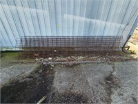 group of metal fence paneling, metal rods