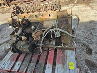 pallet with tractor motor..condition unknown