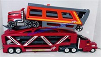 Two Hot Wheels Carrier Trucks 14 and 18 In