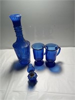 Vintage cobalt blue decanter glasses and a