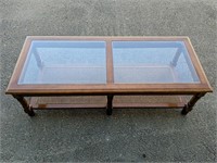 Glass top, wooden coffee table with wicker inlay