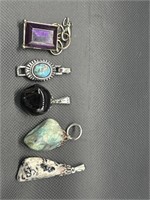 Precious Stone Pendants 
Purple one is glass