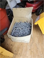 Box full of pole barn nails