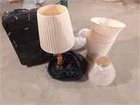 Lamp, lampshades, and luggage