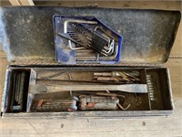 Older metal toolbox with an assortment of hex