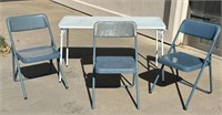 White Folding Table & (3) Blue Folding Chairs