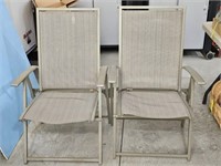 Two folding patio chairs