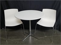 Arper chrome and white table with chairs