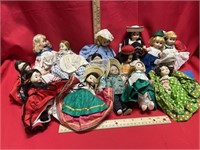 Several Madame Alexander around the world dolls