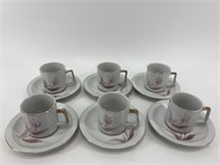 12 Piece porcelain tea and saucer set in original