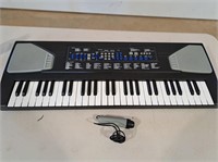 Child's battery operated keyboard with microphone