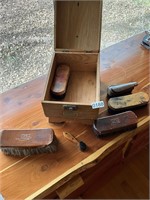 Wooden shoe shine box with brushes. See pics