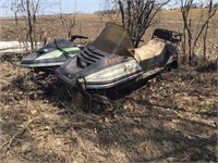 Pair of project Arctic Cat snowmobiles