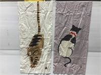 Pair of cloth cat prints