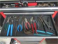 Drawer full that includes wire cutters, needle