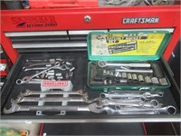 Contents of drawer that includes wrenches. Brands