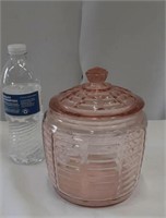 Pink depression cookie jar, has chip on lid