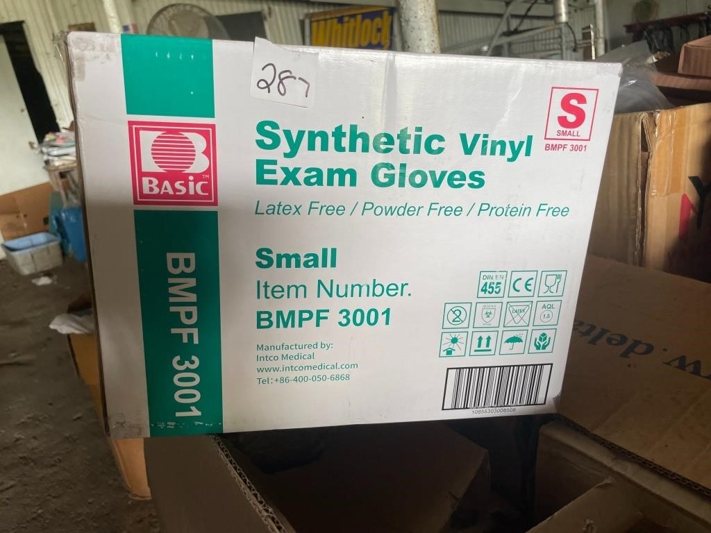 box of NEW vinyl gloves size sm