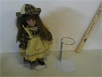 procleian doll with extra stand