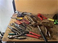 Assorted Pliers and a hammer