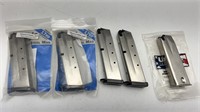 4-NEW TAURUS 9MM & 1 RUGER P85 9MM CLIPS