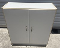 White storage cabinet 
33” wide 13.5” deep 35”