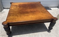 Baker Co. wood coffee table on wheels 48” sq 19”