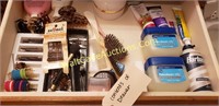 Drawer of hair accessories and lotions