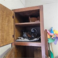 shovels and tools in cabinet