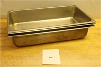 Three stainless steel chaffing table inserts