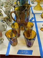Carnival Glass Pitcher And Four Glasses