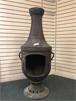 Cast iron freestanding fireplace, missing door,