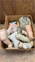 Box of antique doll parts