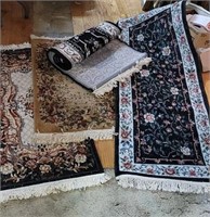 4 Oriental type throw rugs - need cleaning