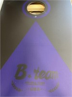 B-Team purple and black cornhole board game