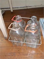 Milk jug carrier with 4 bottles