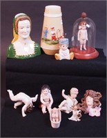 A group of porcelain and bisque figurines