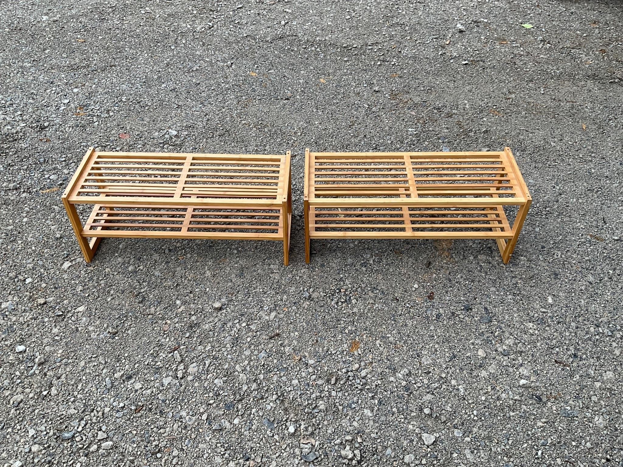 Two bamboo shoe racks